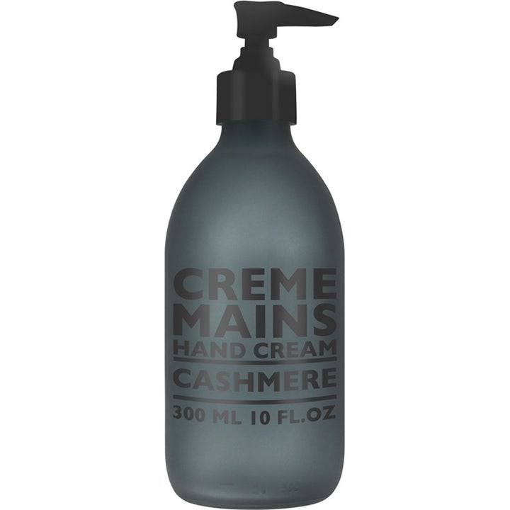 Compagnie de Provence Hand Cream Cashmere 300 ml blødgørende håndcreme i mat mørkegrå glasflaske med sort pumpe