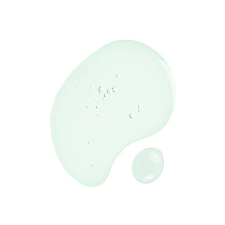 SKIN1004 Madagascar Centella Tea-Trica Relief Ampoule 100 ml beroligende ansigtsserum har en let grøn flydende tekstur