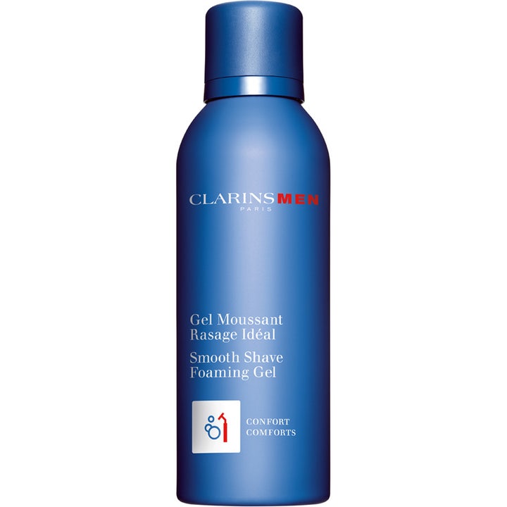 ClarinsMen Smooth Shave Foaming Gel beskyttende barbergel i en mat blå sprayflaske med mørkeblåt låg
