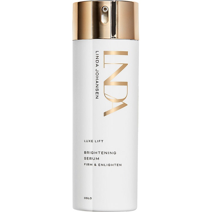 Linda Johansen Luxe Lift Brightening Serum 30 ml glødgivende ansigtsserum i hvid flaske med guldfarvet pumpe