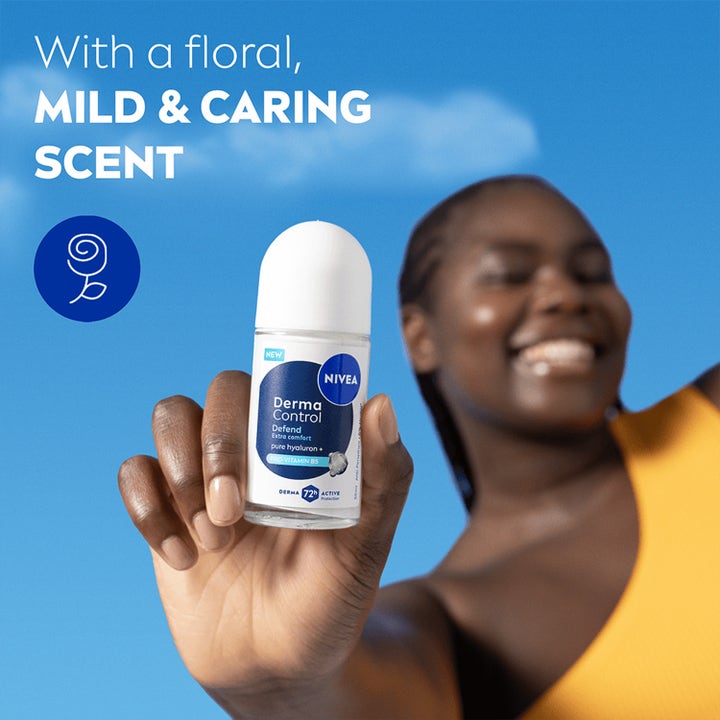 NIVEA Derma Control Defend Roll On 50 ml i hånden på smilende kvinde med mild blomsterduft.