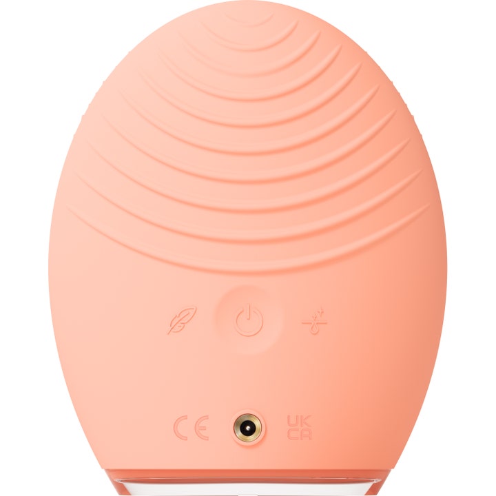 FOREO LUNA 4 Balanced Skin Orange 1 stk ansigtsrens i orange silikone set bagfra med rillede bølger og tændknap