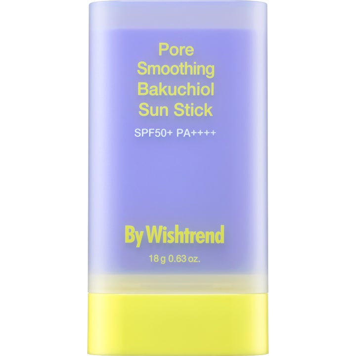 By Wishtrend Pore Smoothing Bakuchiol Sun Stick 18 g solstift der udglatter huden i lilla og gul emballage