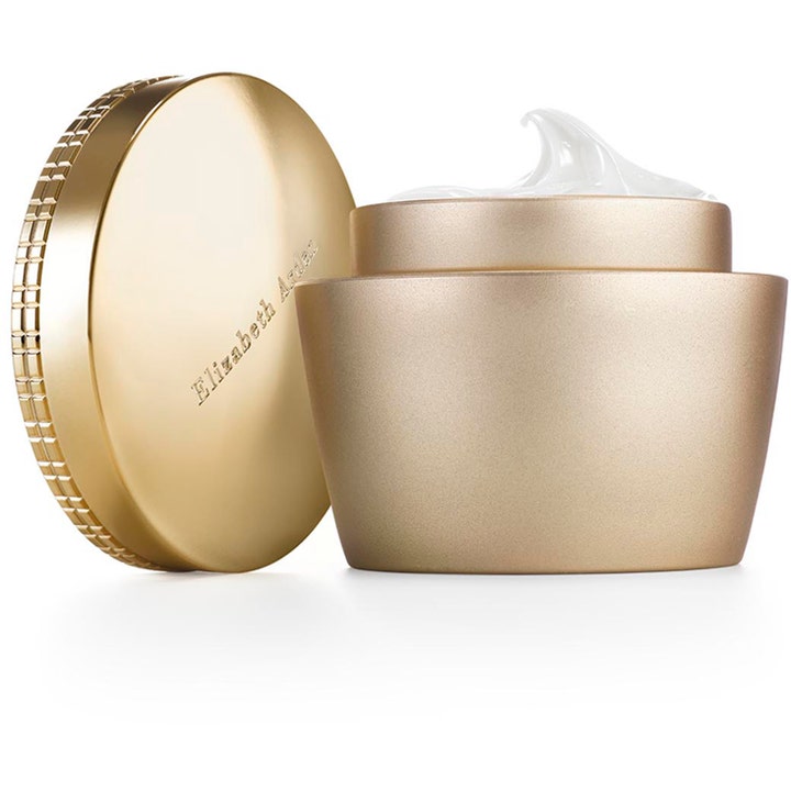 Elizabeth Arden fugtgivende ansigtscreme i en luksuriøs guldkrukke med cremet hvid tekstur og guld låg