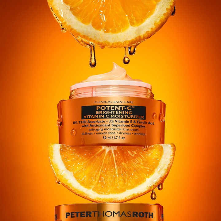 Peter Thomas Roth Potent-C Vitamin C Moisturizer 50 ml lysnende ansigtscreme i orange krukke med friske appelsinskiver