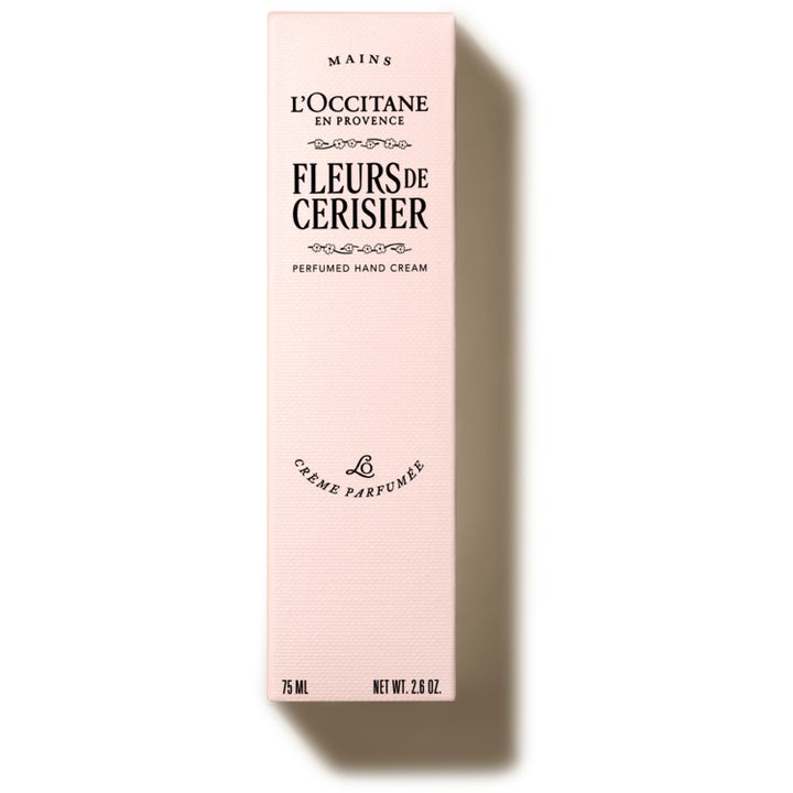 L'Occitane en Provence Fleurs De Cerisier 75 ml fugtgivende håndcreme i en lyserød papæske med sort tekst