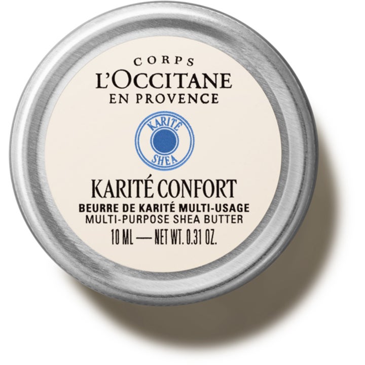 L'Occitane Shea Butter 10 ml blødgørende balm i en rund sølvfarvet metaldåse med hvid og blå etiket