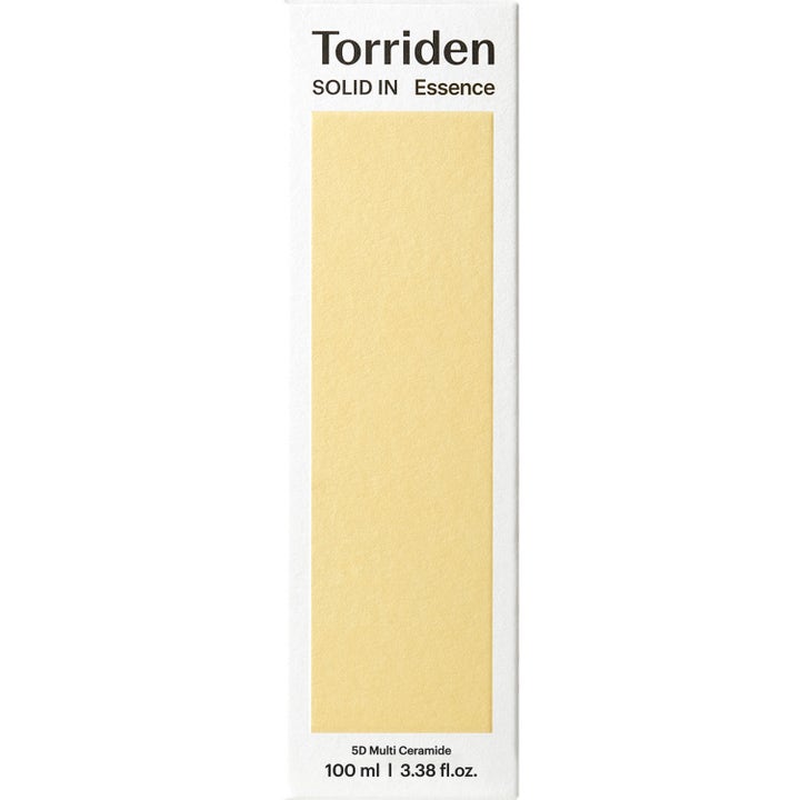 Torriden SOLID-IN All Day Essence 100 ml fugtgivende ceramide essens i hvid papæske med gult panel.