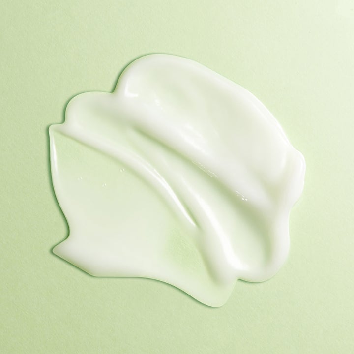 Torriden BALANCEFUL Cica Cream 80 ml beroligende ansigtscreme viser en blød lysegrøn cremetekstur på grøn baggrund