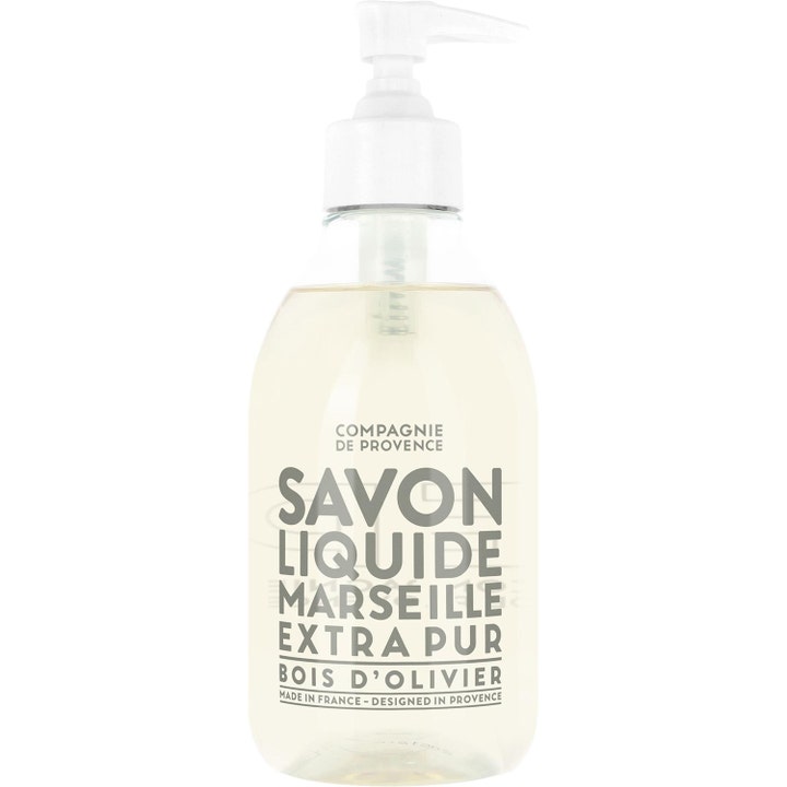 Compagnie de Provence Savon Liquide Marseille Bois d'Olivier rensende håndsæbe i klar flaske med hvid pumpe.