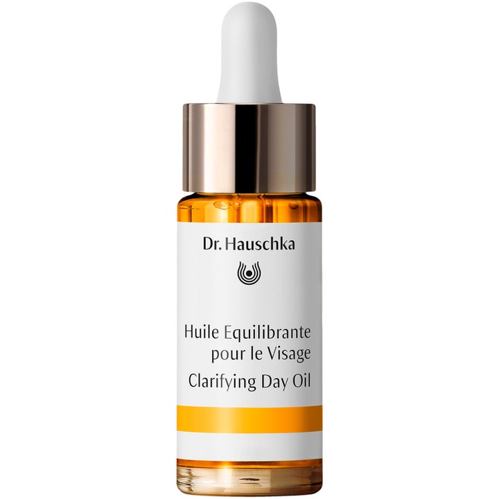 Dr. Hauschka Clarifying Day Oil balancerende ansigtsolie mod urenheder i glasflaske med gylden top og hvid pipette.