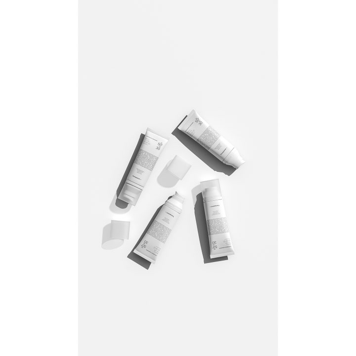Niche Beauty Lab Transparent Lab Lightweight Sunscreen 100 ml solcreme med SPF50+ i hvide tuber uden låg