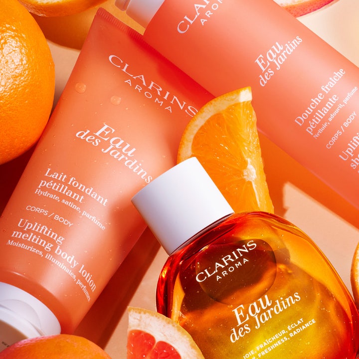 Clarins Eau des Jardins Uplifting Fresh Shower Gel 200 ml opfriskende duschtvål i orange tube med citrusfrugter