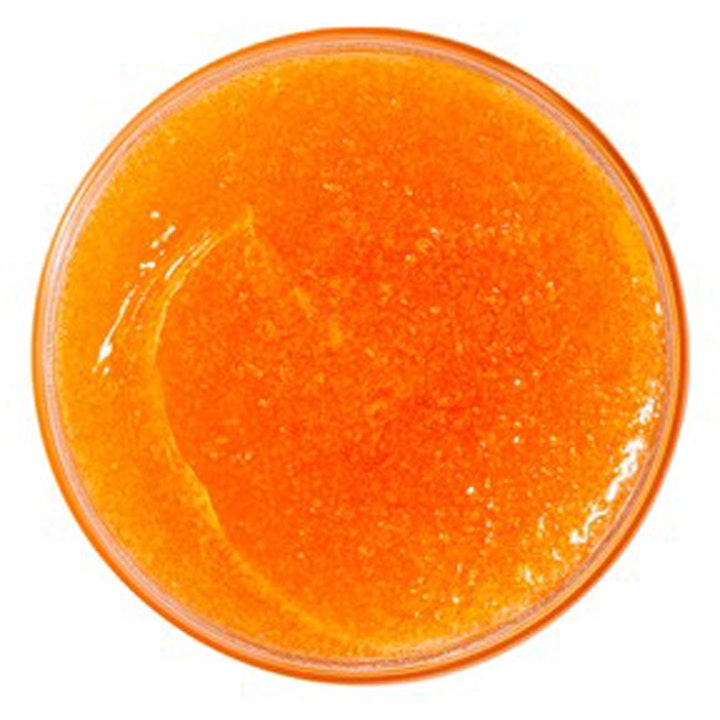 Nuxe Rêve de Miel Body Scrub 175 ml eksfolierende kropspleje med en rig orange kornig tekstur set ovenfra