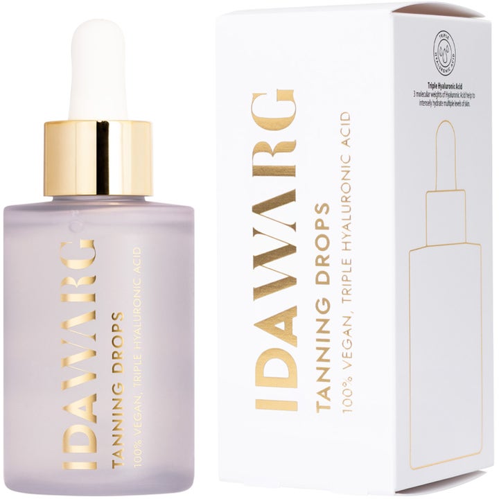 IDA WARG Beauty Tanning Drops 45 ml vegansk brun uden sol med hyaluronsyre i frostet glasflaske og hvid æske.