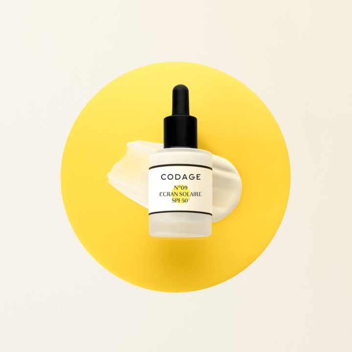 Codage Paris The Serum N°09 Sun Shield SPF 50+ 30 ml beskyttende solcreme i glasflaske med hvid tekstur