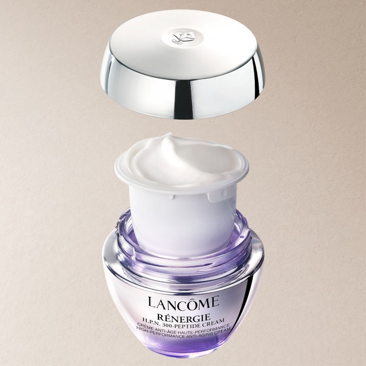 Lancôme Rénergie H.P.N. UVMUNE Cream SPF50 50 ml anti-aging dagcreme med hvid creme i refill-indsats og lilla krukke.