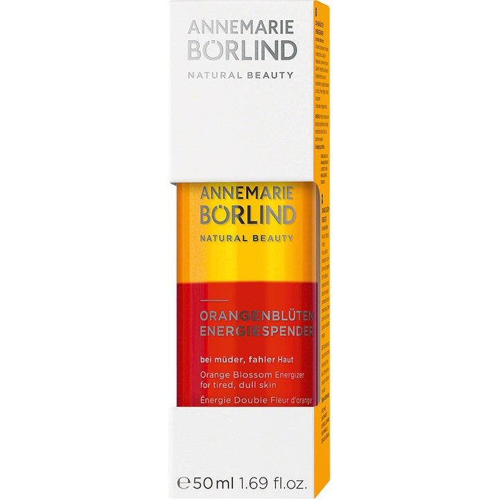 Annemarie Börlind Orange Blossom Energizer 50 ml giver glød til træt hud i en flaske med orange og rød væske.