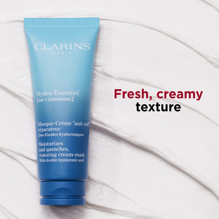 Clarins Hydra-Essentiel 75 ml fugtgivende ansigtsmaske med ceramider i blå tube på en cremet hvid tekstur