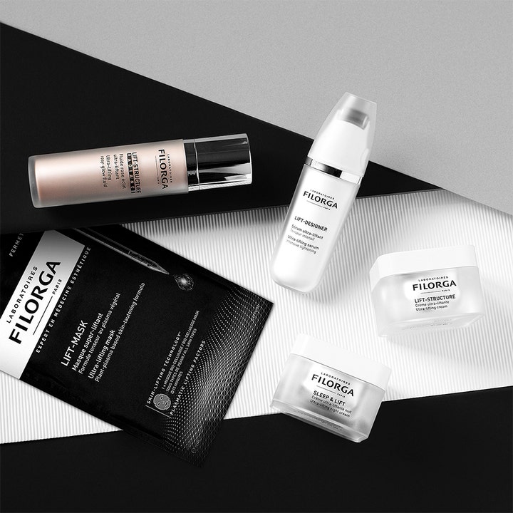 Filorga Lift-Mask 23 ml opstrammende sheet mask i sort emballage sammen med andre hudplejeprodukter