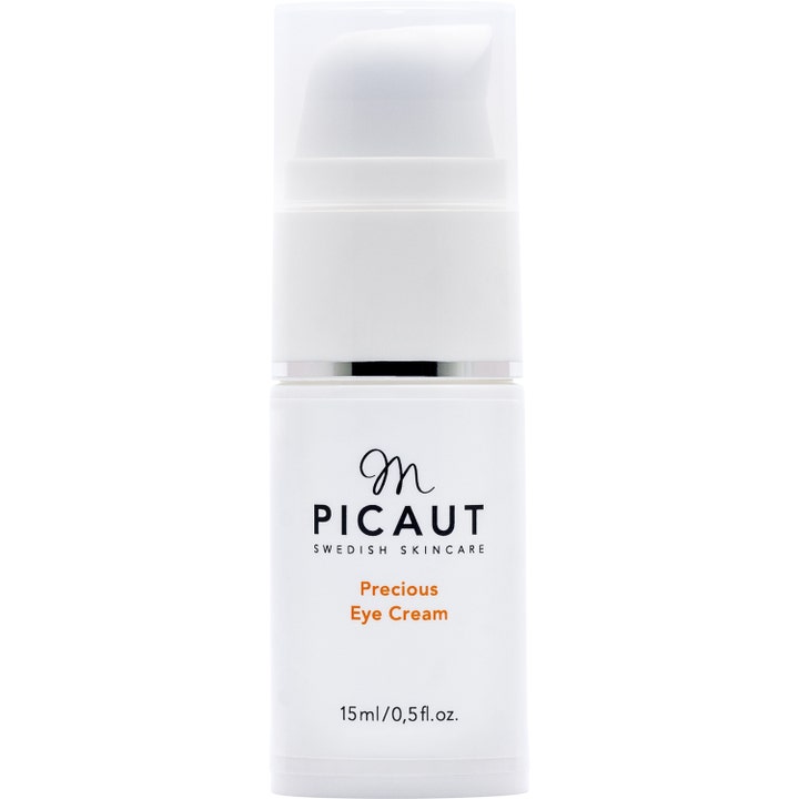 M. Picaut Precious Eye Cream 15 ml plejende øjencreme i hvid pumpeflaske med gennemsigtigt låg og sølvdetalje.