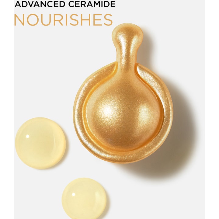 Elizabeth Arden Advanced Ceramide 90 kapsler ansigtsserum nærer huden vist med guld kapsel og klar serum tekstur.