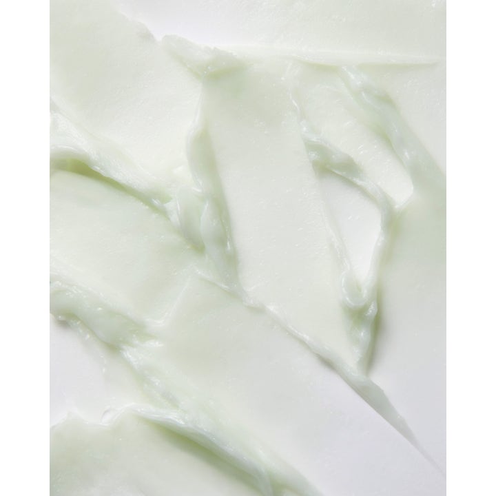 Banila Co Clean It Zero Cleansing Balm Pore Clarifying 100 ml ansigtsrens med en blød lysegrøn cremet tekstur.