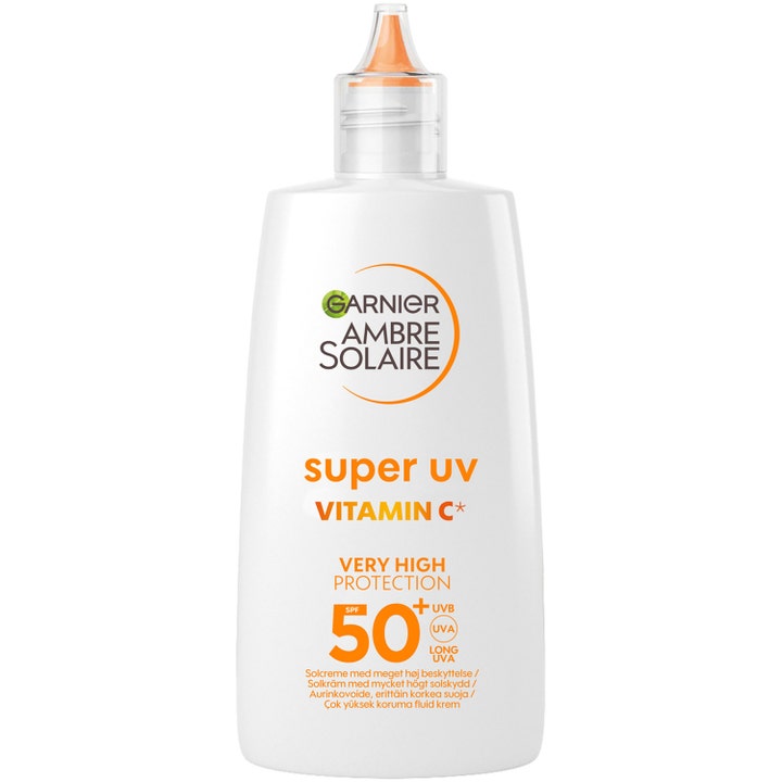 Garnier Ambre Solaire Super UV Vitamin C SPF 50+ solcreme i hvid plastflaske med orange tud og gennemsigtigt låg