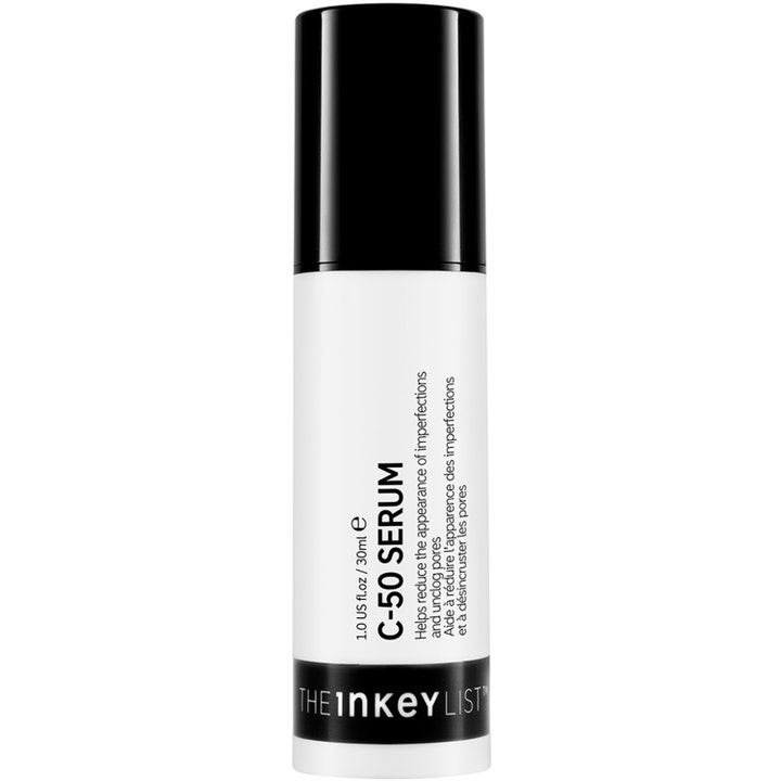 The Inkey List C-50 Serum 30 ml mod urenheder i en hvid cylinderformet flaske med sort låg
