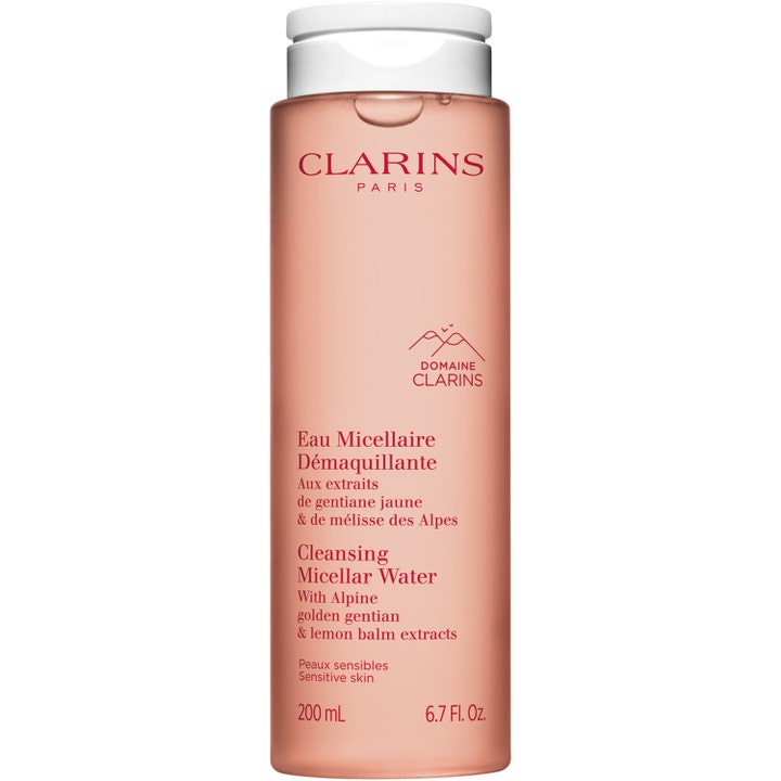 Clarins Cleansing Micellar Water 200 ml beroligende ansigtsrens i ferskenfarvet gennemsigtig flaske med hvidt låg