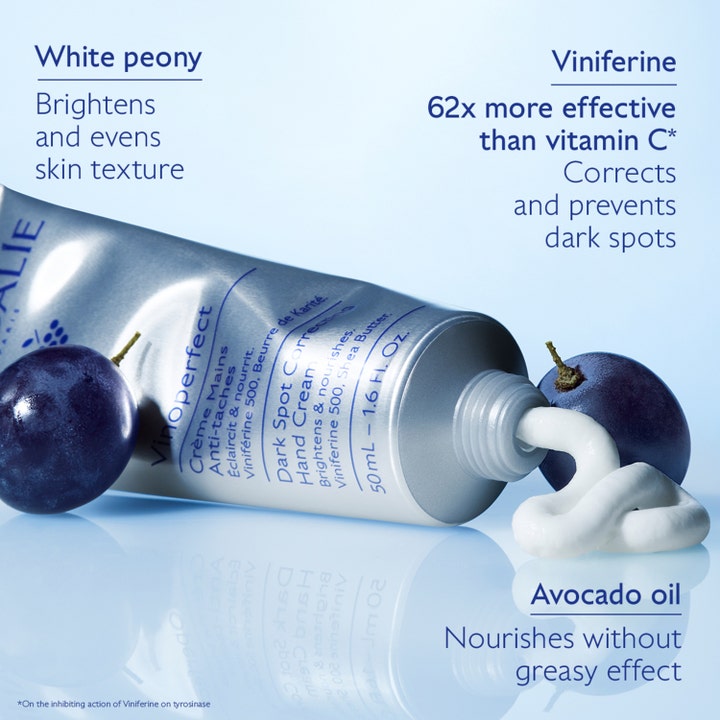 Caudalie Vinoperfect Hand Cream 50 ml i tube med hvid creme og vindruer der korrigerer mørke pletter