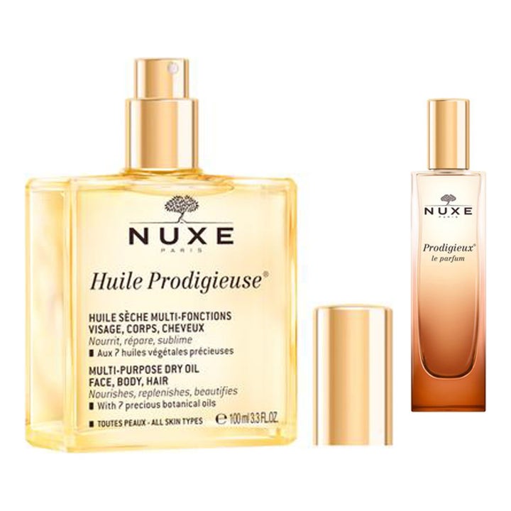 Nuxe Prodigieux le parfum og Huile Prodigieuse nærende tørolie i elegante glasflasker med gyldne låg.