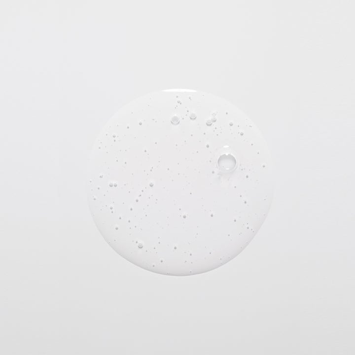 Jorgobé BHA Exfoliator 150 ml eksfolierende serum giver glød vist som en klar flydende dråbe med små bobler
