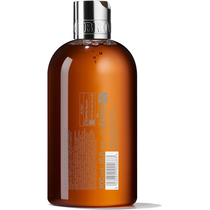 Molton Brown Black Peppercorn Body Wash 300 ml bodyshampoo i brun flaske viser ingredienser og genbrugssymboler.
