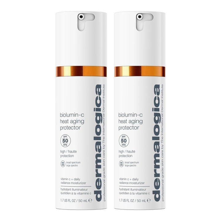 Dermalogica Biolumin-C Heat Aging Protector SPF 50 50 ml i hvide pumpeflasker med orange detaljer.