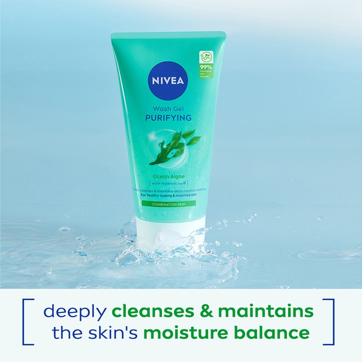 NIVEA Wash Gel Purifying 150 ml rensende ansigtsvask med havalger i turkis tube omgivet af vandstænk.