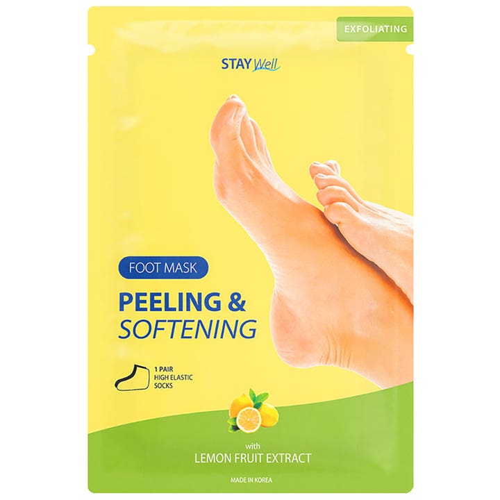 Stay Well Foot Mask Peeling & Softening 1 par eksfolierende fodmaske i gul emballage med citroner og bare fødder