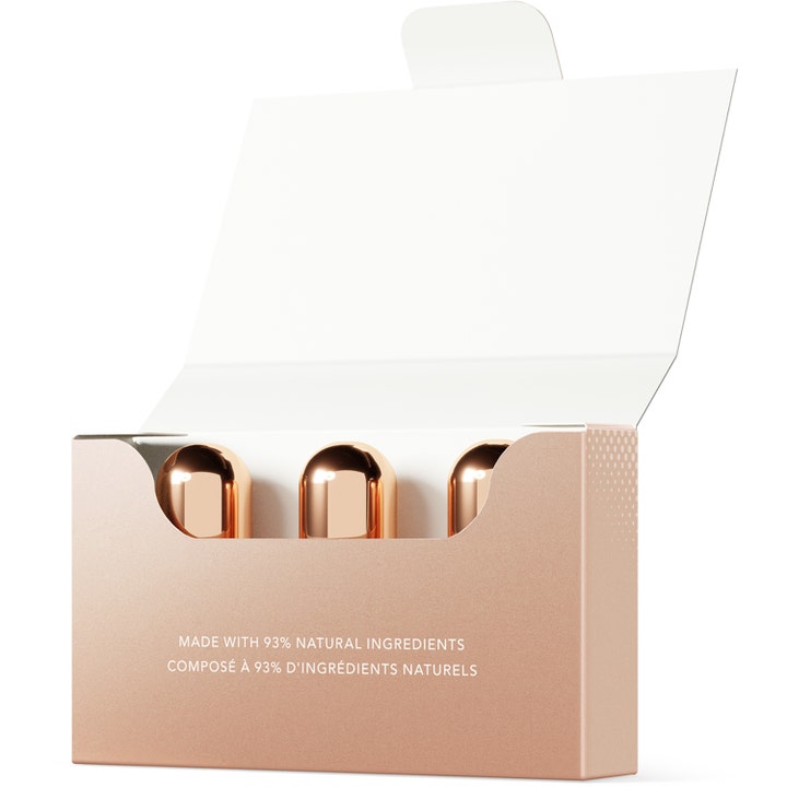 FOREO SUPERCHARGED Eye & Lip Contour Booster 10,5 ml serum i rosaguld æske med tre kobberfarvede beholdere.