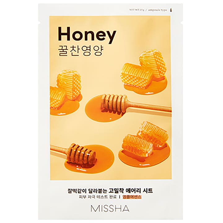 Missha Honey Airy Fit Sheet Mask 19g nærende ansigtsmaske i hvid emballage prydet med gyldne bikager og honning.