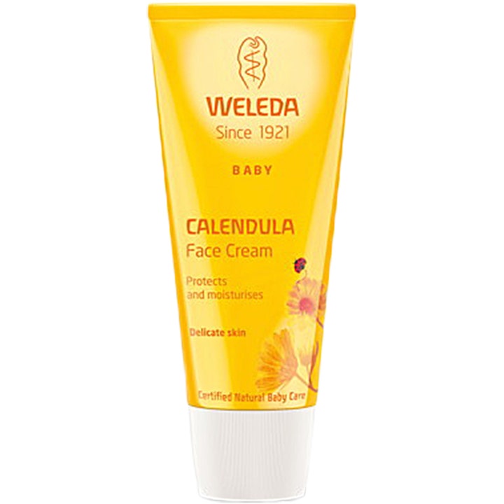 Weleda Baby Calendula Face Cream beskyttende ansigtscreme i gul tube med hvidt låg og orange blomster.