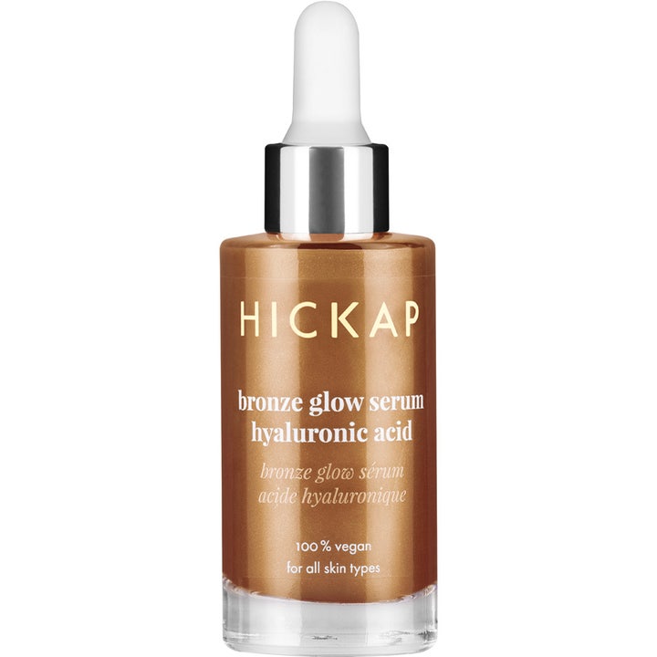Hickap Bronze Glow Serum fugtgivende ansigtsserum med hyaluronsyre i glasflaske med hvid pipette og bronzeskær.