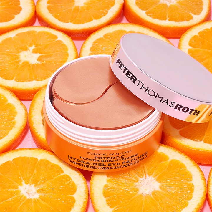 Peter Thomas Roth Potent-C Eye Patches 90 g lysner med C-vitamin i orange krukke med friske appelsinskiver