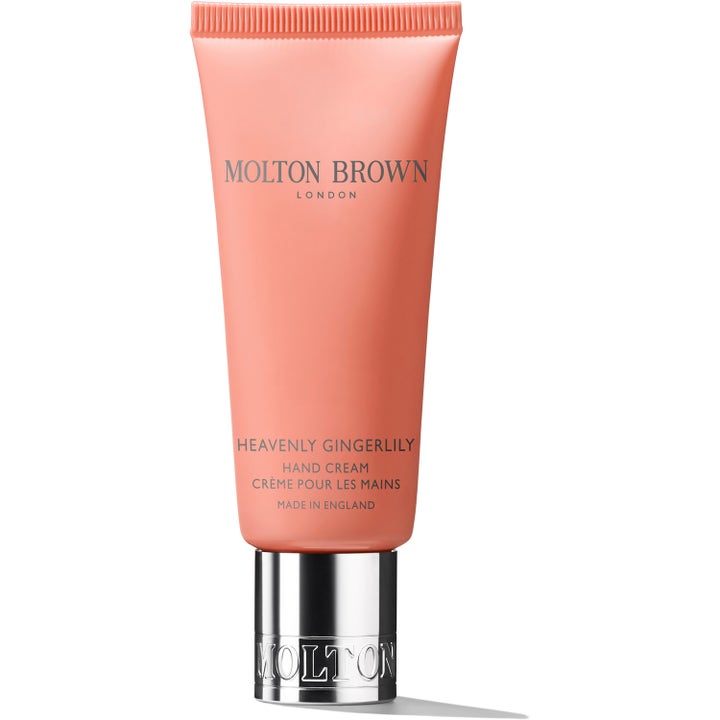 Molton Brown Heavenly Gingerlily Hand Cream fugtgivende håndcreme i en koralfarvet tube med elegant sølvlåg