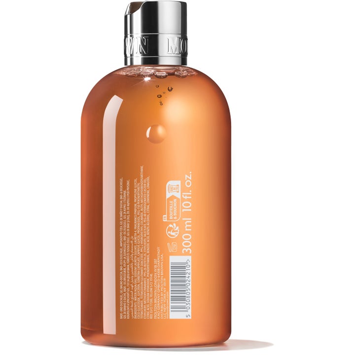 Molton Brown Sunlit Clementine & Vetiver 300 ml showergel giver frisk kropspleje i klar flaske med orange gel.