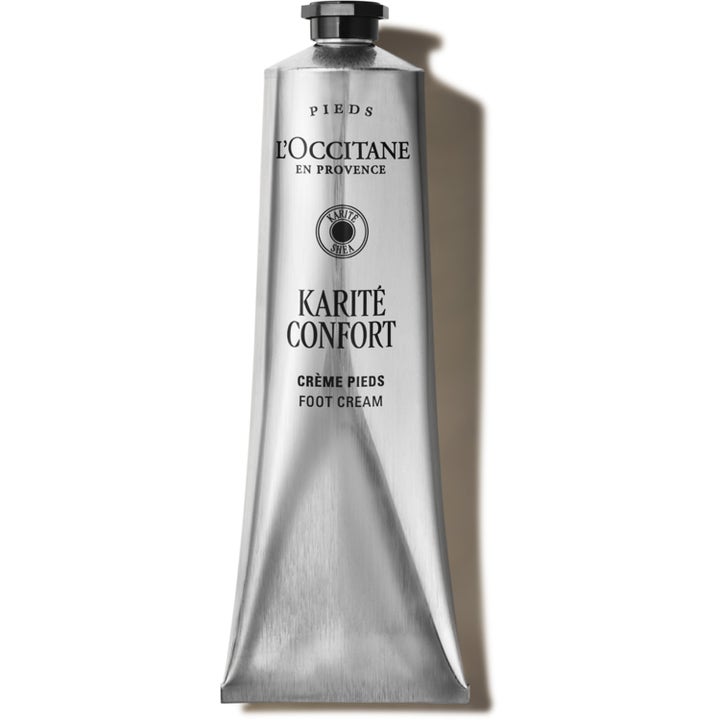 L'Occitane Karité Confort Foot Cream blødgørende fodcreme i en sølvfarvet metaltube med sort skruelåg.