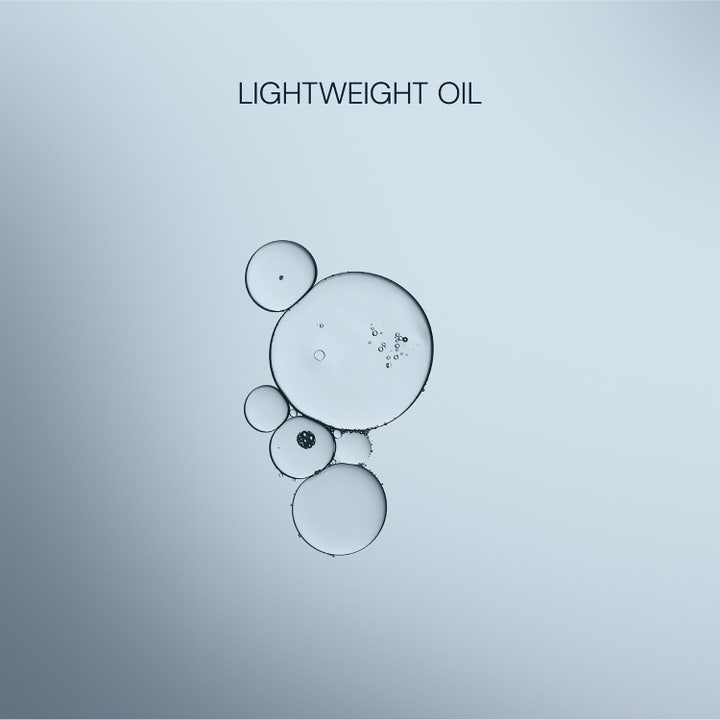 Elemis Pro-Collagen Marine Oil 15 ml fugtgivende ansigtsolie viser teksten Lightweight Oil og dråber på blå baggrund