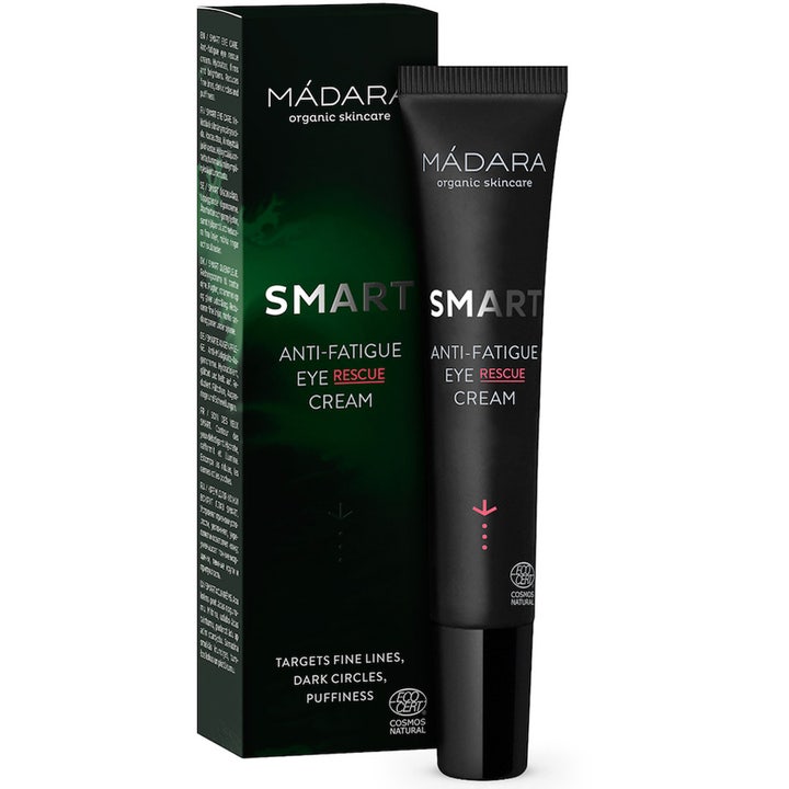 MÁDARA Smart Anti-fatigue Eye Rescue Cream 15 ml øjencreme mod mørke rande i sort tube og æske med grønt design