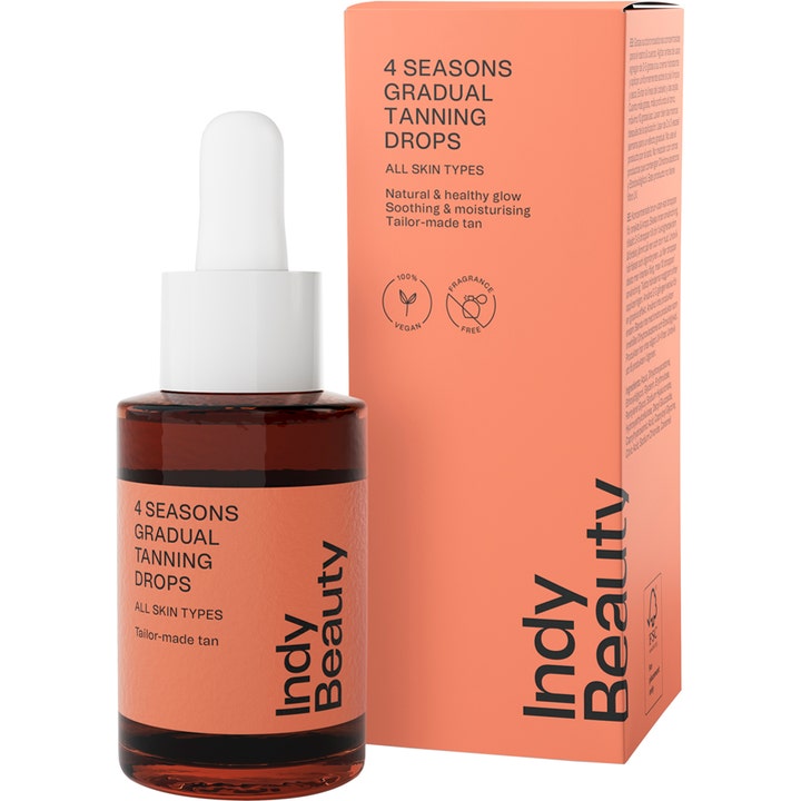 Indy Beauty Gradual Tan Drops 30 ml giver en solkysset glød i en mørk glasflaske med hvid pipette og orange æske.