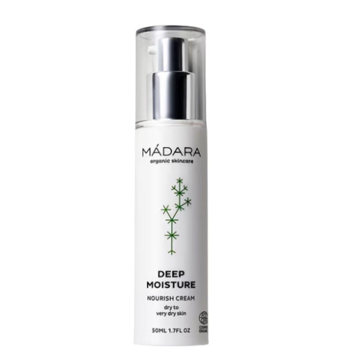 Mádara Deep Moisture Nourish Cream ansigtscreme til tør hud i hvid flaske med sølvpumpe og gennemsigtigt låg.