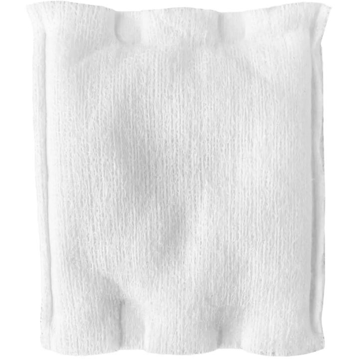 Topz Premium The Cleansing Pad 40 stk. hudplejeværktøj til ansigtsrens er en hvid rektangulær pad med blød struktur.